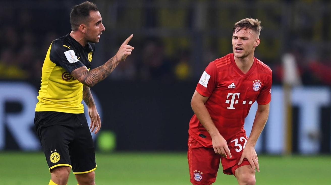 Emotional auf dem Spielfeld: Joshua Kimmich, hier mit BVB-Stürmer Paco Alcacer (li.).