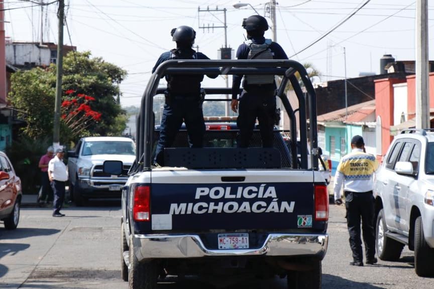 Polizisten führen einen Einsatz in Uruapan durch: Immer wieder kommt es in der Region zu blutigen Auseinandersetzungen von Kartells.