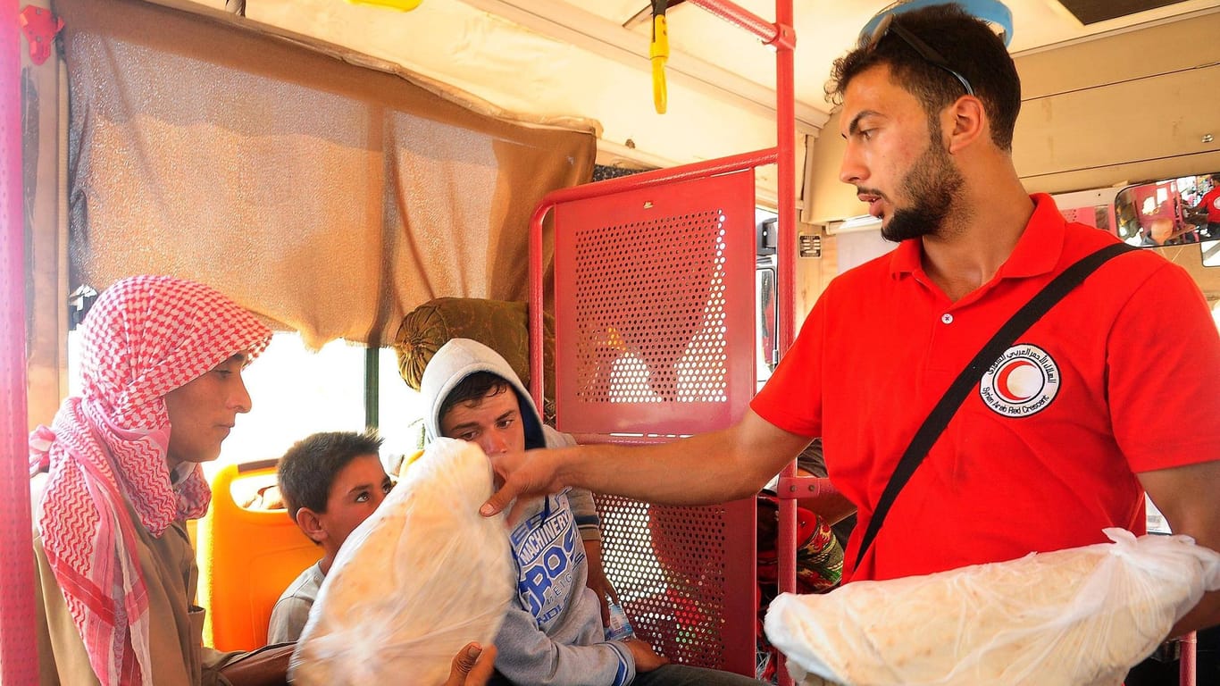 Geflüchtete bei Homs, Syrien: Die Helfer riskieren viel.