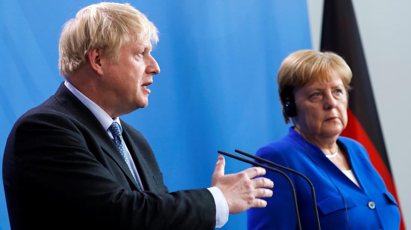 Boris Johnson und Angela Merkel auf der Pressekonferenz: Der britische Premier zeigte sich optimistisch, eine Brexit-Lösung finden zu können.