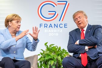 Merkel und Trump im Gespräch in Biarritz: viele Konfliktthemen.