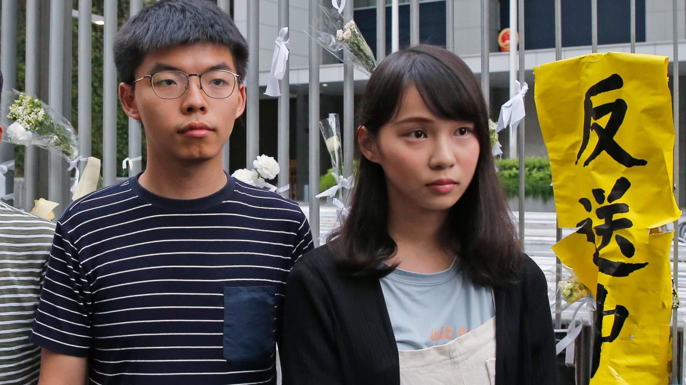 Joshua Wong (l.) und Agnes Chow sind führende Aktivisten der Hongkonger Protestbewegung.