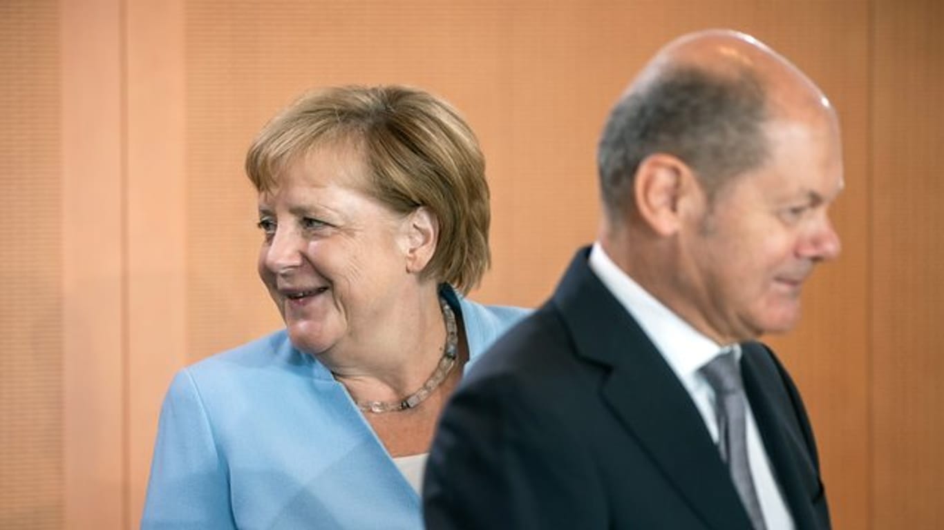 Kanzlerin Angela Merkel und Vizekanzler Olaf Scholz vor einer Kabinettssitzung im Kanzleramt.