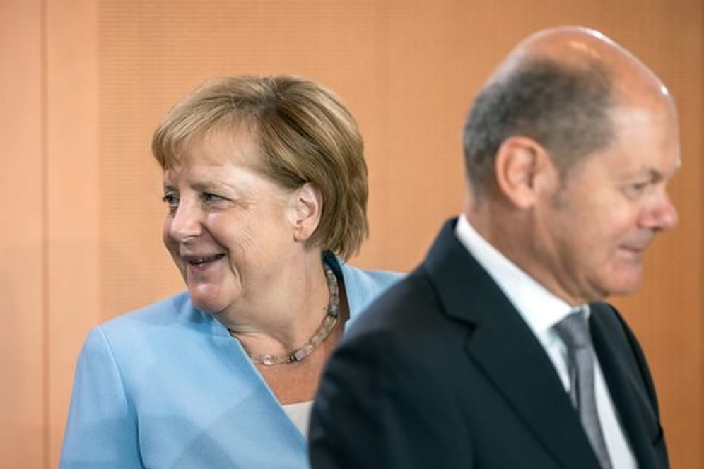Kanzlerin Angela Merkel und Vizekanzler Olaf Scholz vor einer Kabinettssitzung im Kanzleramt.