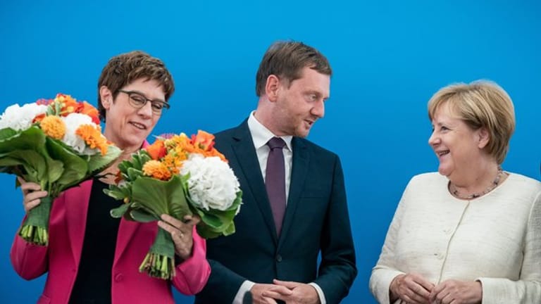 CDU-Chefin Kramp-Karrenbauer, Sachsens Ministerpräsident Kretschmer und Kanzlerin Merkel im Konrad-Adenauer-Haus in Berlin.