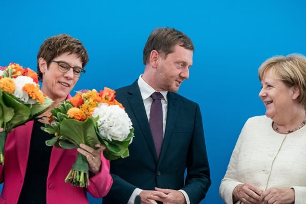 CDU-Chefin Kramp-Karrenbauer, Sachsens Ministerpräsident Kretschmer und Kanzlerin Merkel im Konrad-Adenauer-Haus in Berlin.