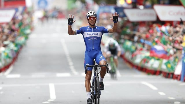 Der Belgier Philippe Gilbert feiert seinen Sieg bei der 12.