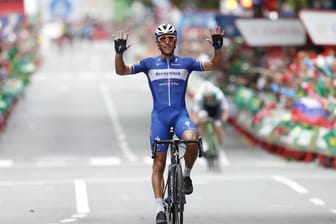 Der Belgier Philippe Gilbert feiert seinen Sieg bei der 12.