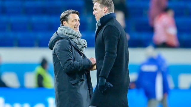 Niko Kovac (l) will mit dem FC Bayern Julian Nagelsmann mit RB Leipzig vom Spitzenplatz der Tabelle verdrängen. Niko Kovac (l) will mit dem FC Bayern Julian Nagelsmann mit RB Leipzig vom Spitzenplatz der Tabelle verdrängen.