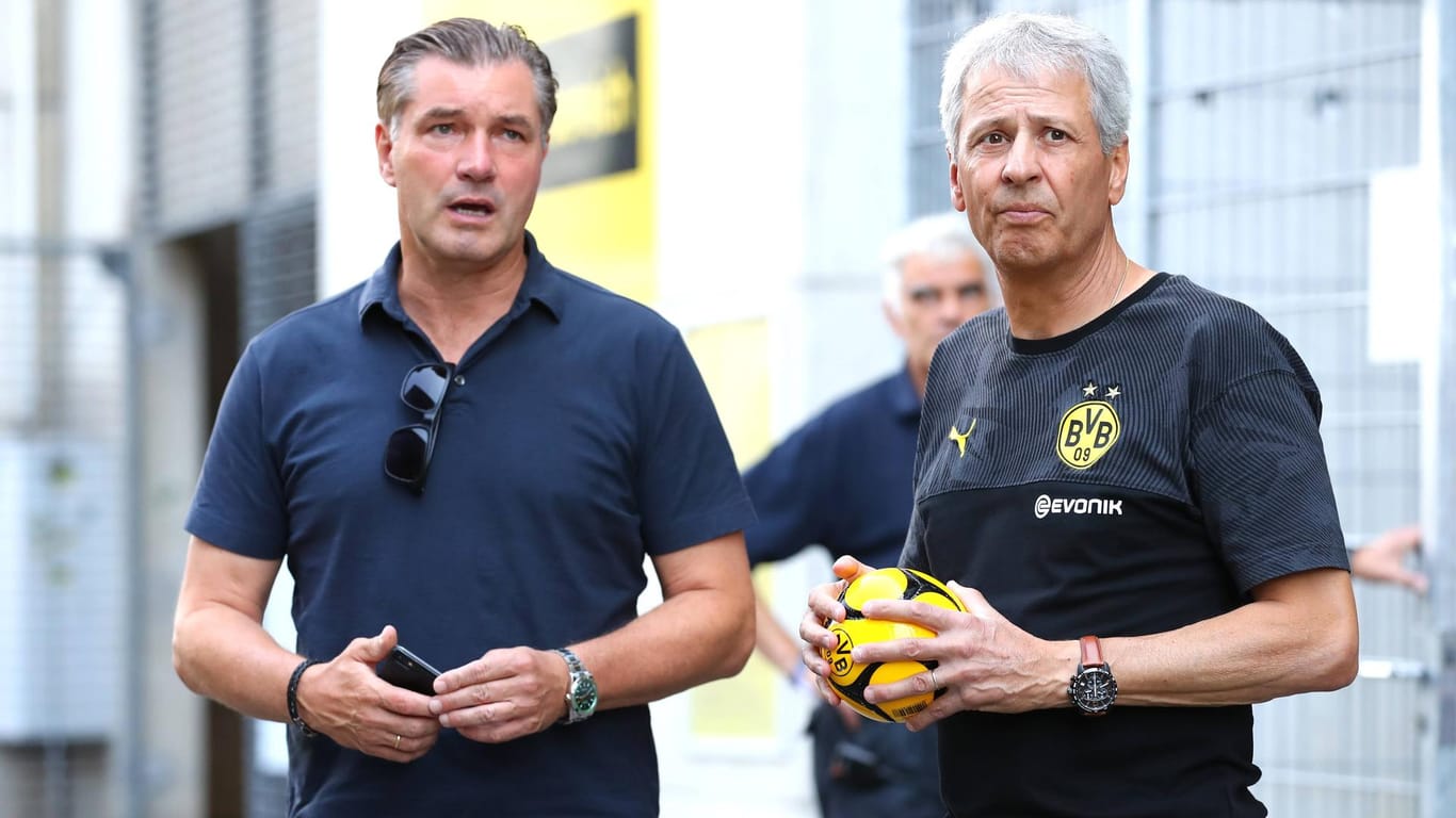 Sportdirektor Michael Zorc (l.) und Trainer Lucien Favre: Beim BVB häufen sich die Berichte über Meinungsverschiedenheiten.