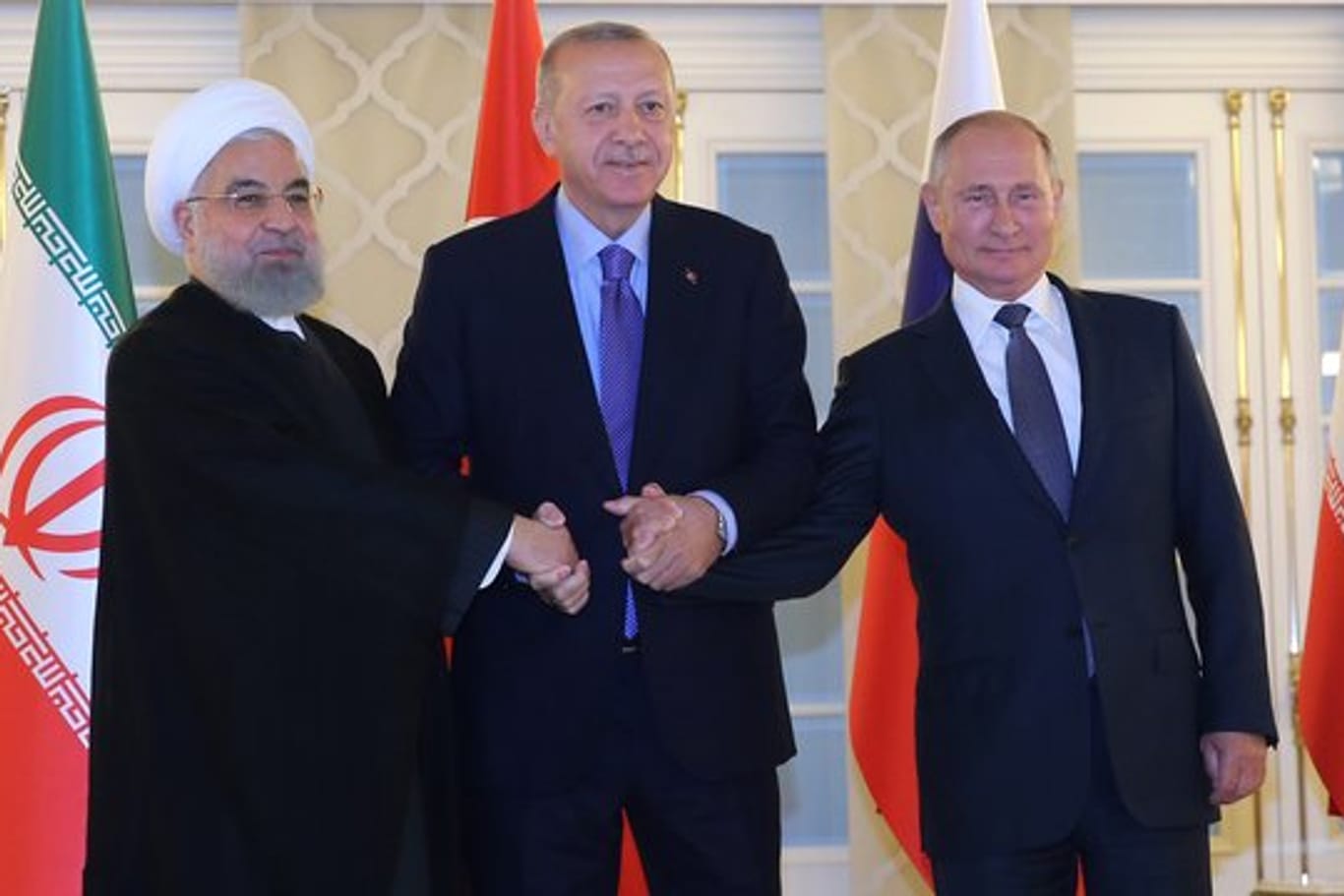 Irans Präsident Ruhani neben Gastgeber Erdogan und seinem russischen Amtskollegen Putin.
