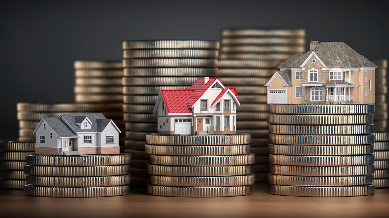 Häuser auf Geld: Immobilienkredite für zehn Jahre haben momentan besonders niedrige Zinsen.