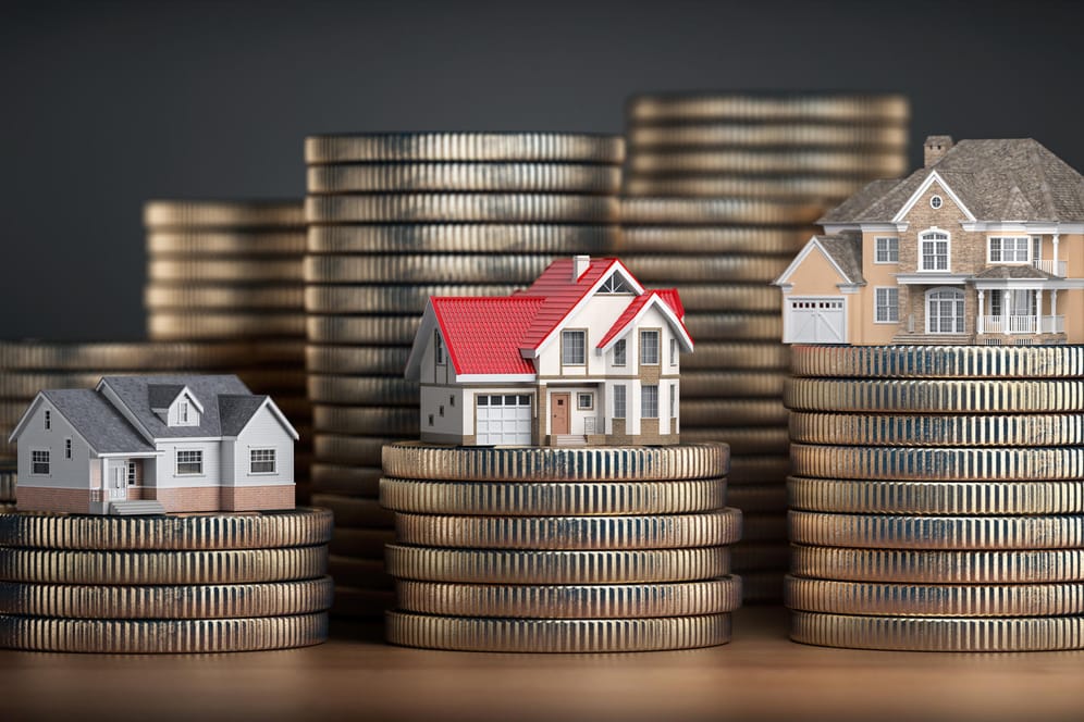 Häuser auf Geld: Immobilienkredite für zehn Jahre haben momentan besonders niedrige Zinsen.