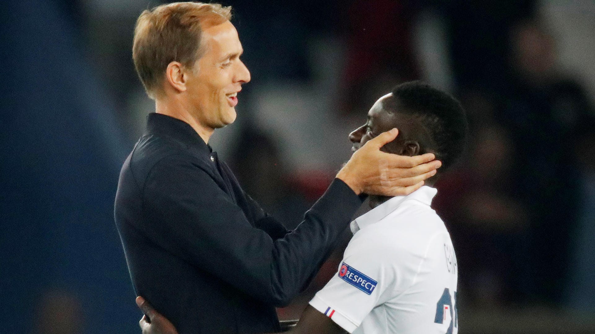 Glücklich über den Sieg gegen Real Madrid: PSG-Trainer Tuchel mit Mittelfeldspieler Idrissa Gueye.