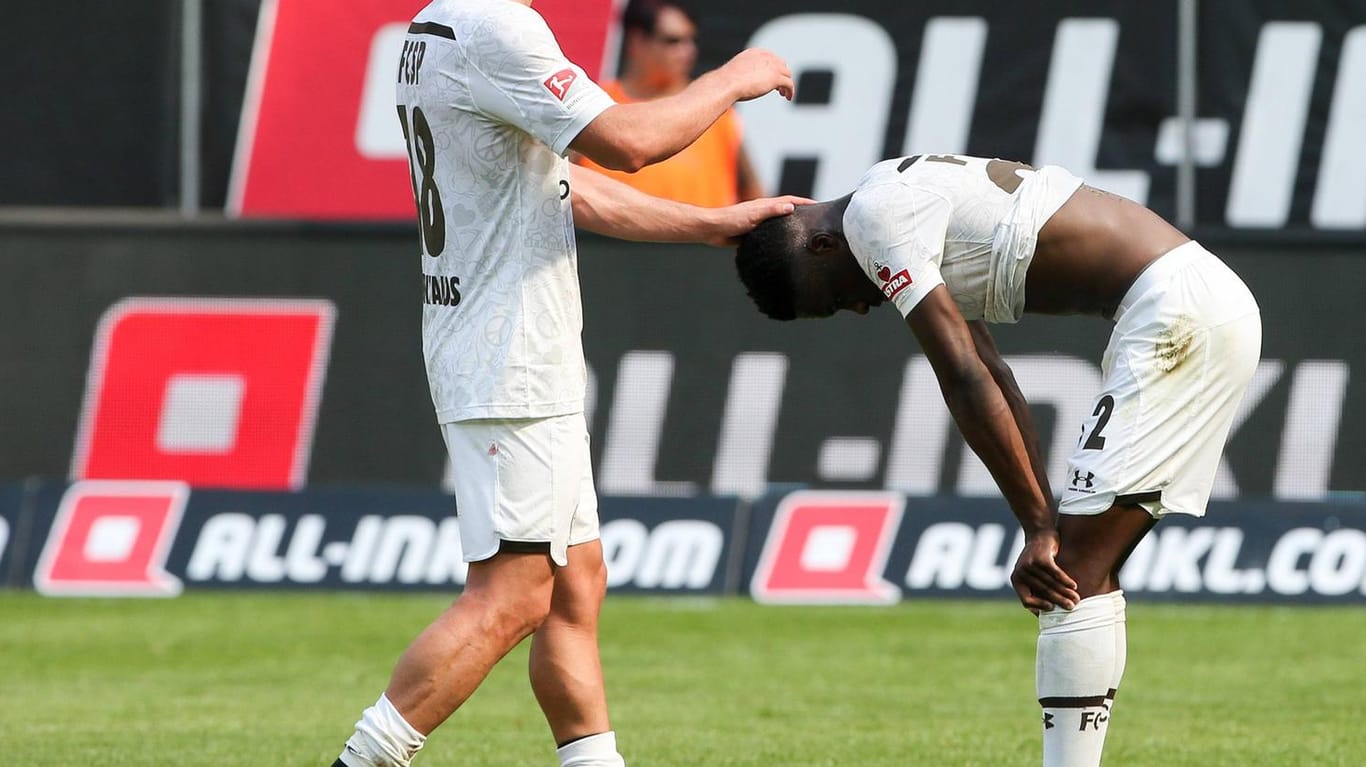 Dimitrios Diamantakos und Christian Conteh: Der FC St. Pauli muss auf Conteh im Spiel gegen Nürnberg verzichten.