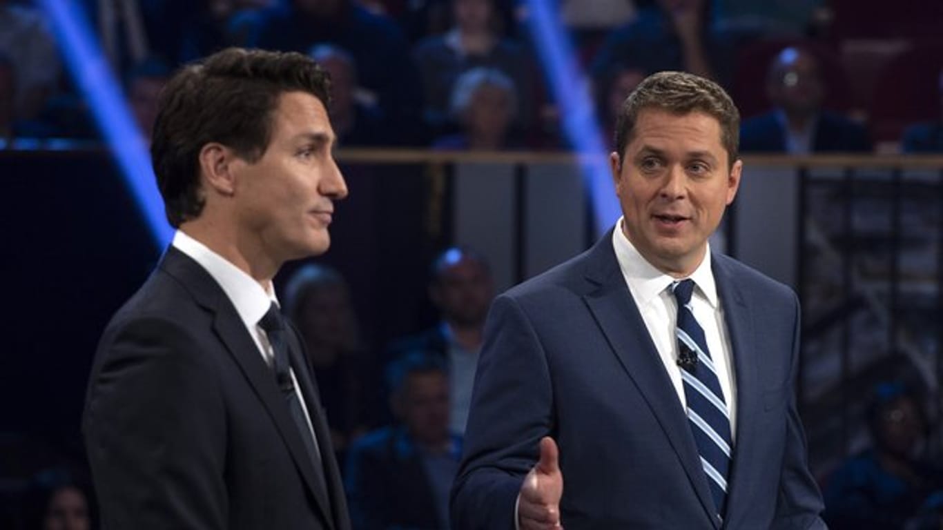 Premierminister Justin Trudeau (l) zusammen mit dem Vorsitzenden der Konservativen, Andrew Scheer.