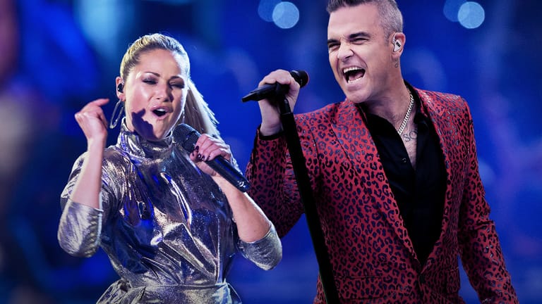 Helene Fischer und Robbie Williams: Auf dem neuen Album des britischen Sängers ist auch ein Duett mit dem deutschen Star zu hören. (Montage)