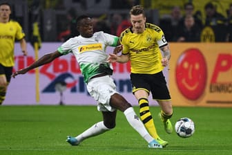 Denis Zakaria (li.) und Marco Reus (re): Umkämpftes Spiel in Dortmund.