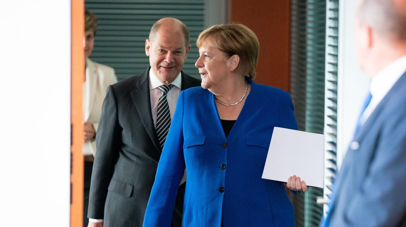 Bundeskanzlerin Angela Merkel (CDU) und Finanzminister Olaf Scholz (SPD): Das Kabinett hat die ersten Maßnahmen des Klimapakets beschlossen.