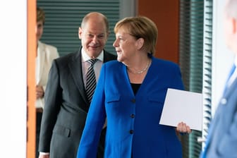 Bundeskanzlerin Angela Merkel (CDU) und Finanzminister Olaf Scholz (SPD): Das Kabinett hat die ersten Maßnahmen des Klimapakets beschlossen.