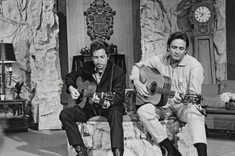 Bob Dylan (l) und Johnny Cash.