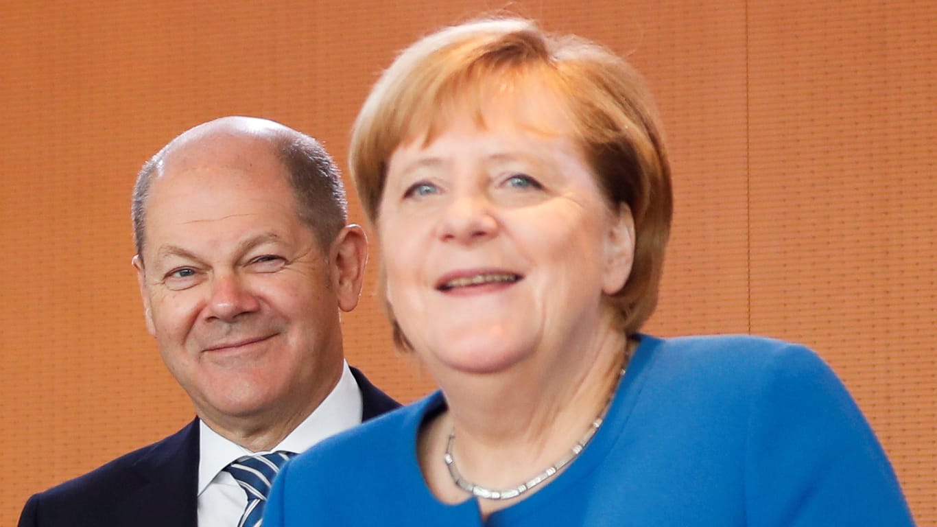 Olaf Scholz, Angela Merkel: Die große Koalition will weiter machen.
