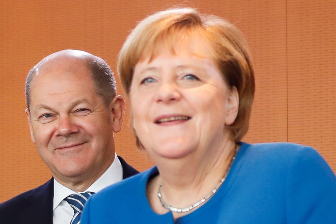 Olaf Scholz, Angela Merkel: Die große Koalition will weiter machen.