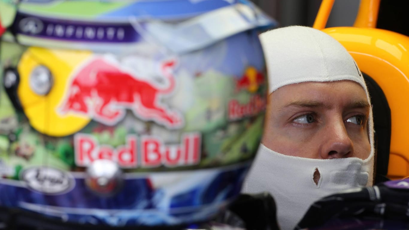 Wechselte zu Red-Bull-Zeiten regelmäßig sein Helm-Farbe: Ferrari-Pilot Sebastian Vette – hier noch bei Red Bull (2013).