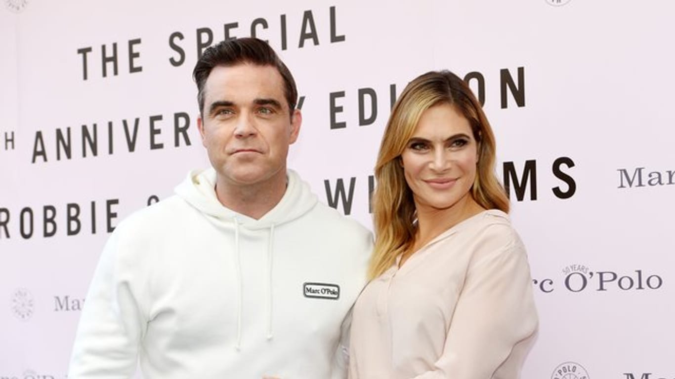 Robbie Williams mit Ehefrau Ayda bei der Vorstellung seiner Mode-Kollektion.