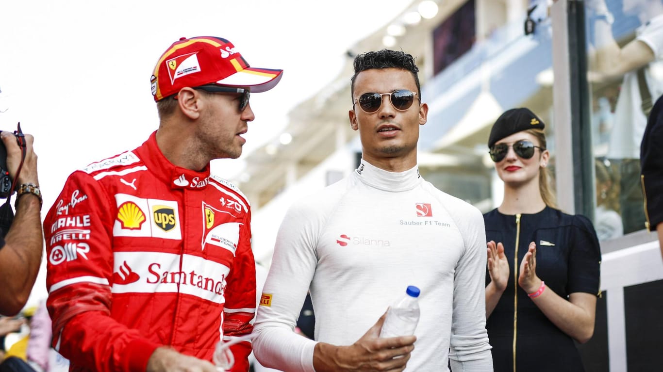 Hat für Wehrlein (r.) beim Ferrari-Simulatorjob ein gutes Wort eingelegt: Sebastian Vettel (l.).