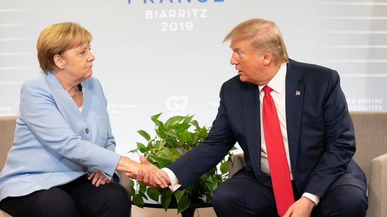 Donald Trump und Angela Merkel (Archvibild): Was halten Deutsche und Amerikaner voneinander?