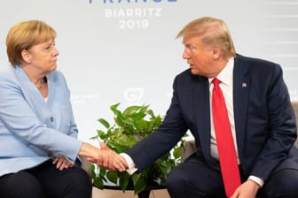 Donald Trump und Angela Merkel (Archvibild): Was halten Deutsche und Amerikaner voneinander?