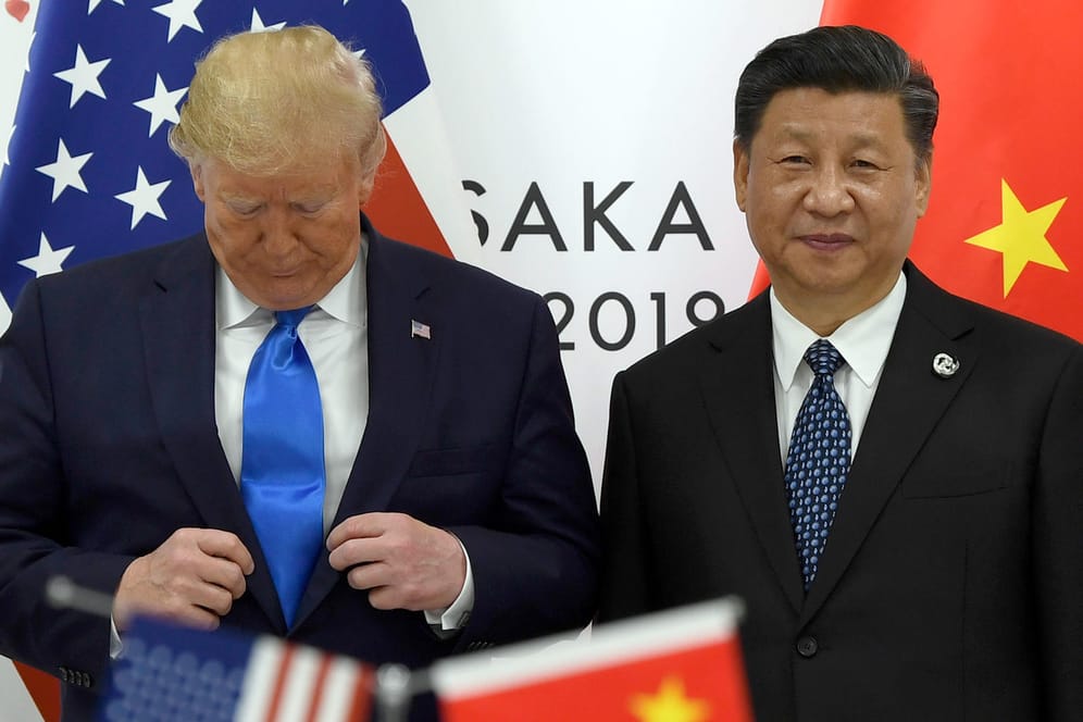 Donald Trump mit Xi Jinping (Archivbild): Die USA und China führen einen Handelskrieg, der auch die Weltwirtschaft ins Wanken bringt.