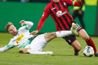 Christoph Kramer (l) bleibt Borussia Mönchengladbach erhalten.
