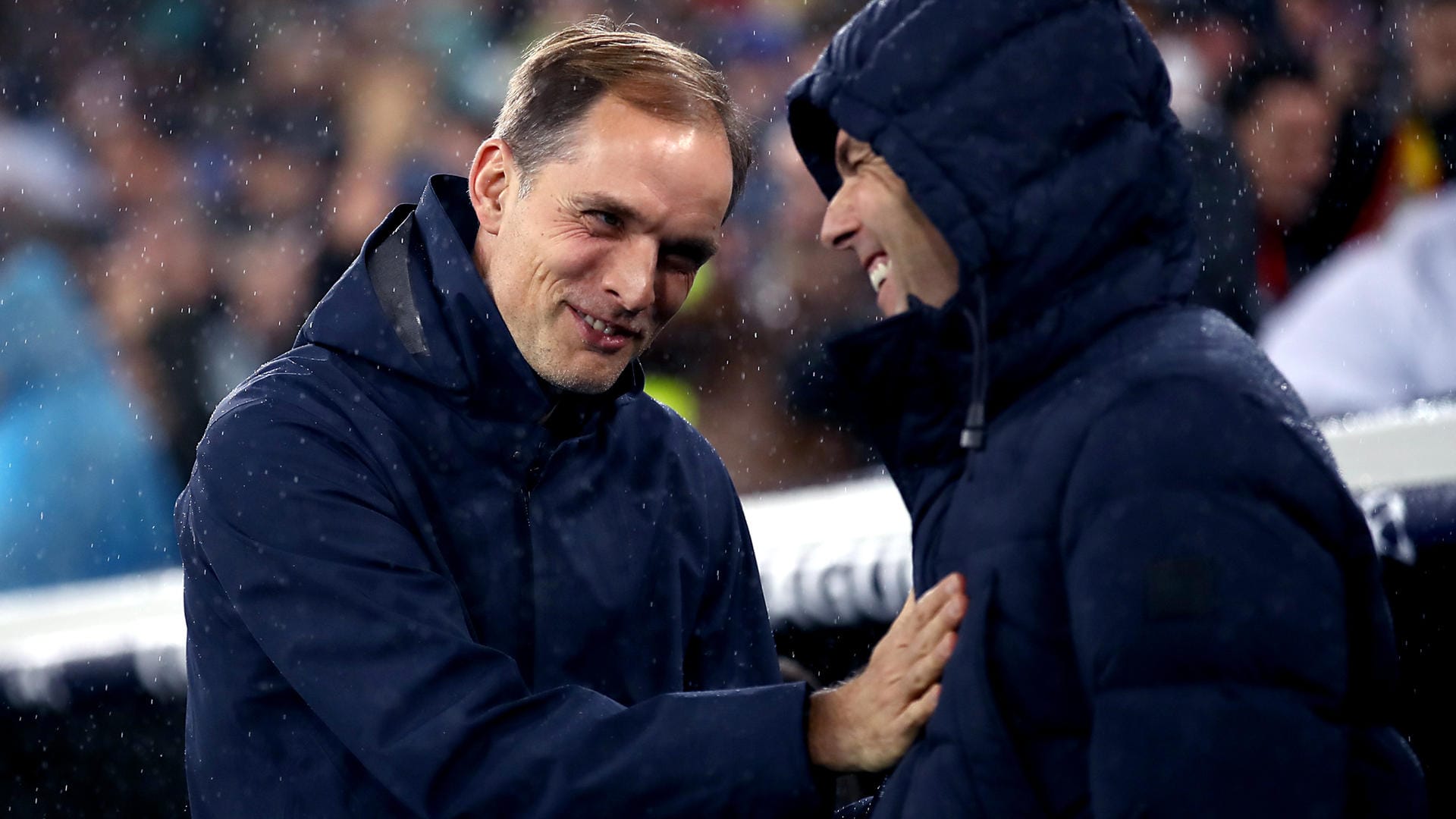 Tumas Tuchel: Der Paris-Coach hier im Plausch mit Real Madrids Trainer Zinedine Zidane.