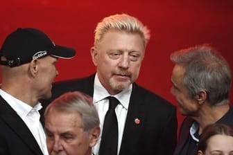 Boris Becker (M), Axel Schulz (l), Jörg Wontorra (2.