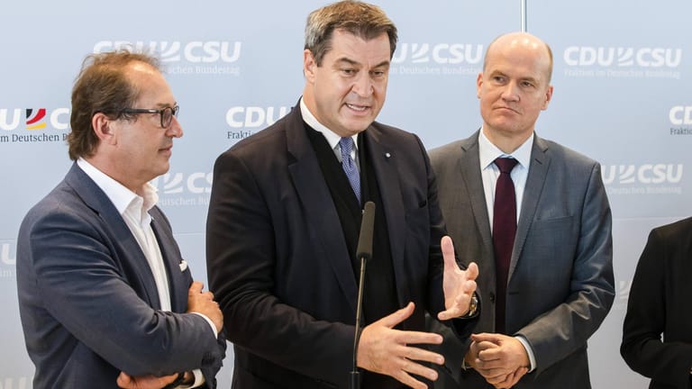 CSU-Chef Markus Söder und CDU-Fraktionsvorsitzender Ralph Brinkhaus: Während Söder eine Warnung an die SPD aussprach sieht Brinkhaus in der Linksverschiebung der SPD eine Chance für die Union.