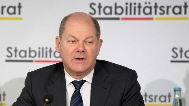 Bundesfinanzministe Olaf Scholz spricht während einer Pressekonferenz zu den Ergebnissen der 20.