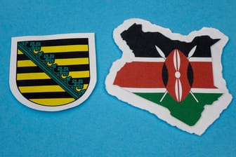 Die Flaggen von Sachsen und dem ostafrikanischen Land Kenia (Symbolbild): Ein Bündnis aus CDU, Grünen und SPD gibt es bereits in Sachsen-Anhalt und Brandenburg.