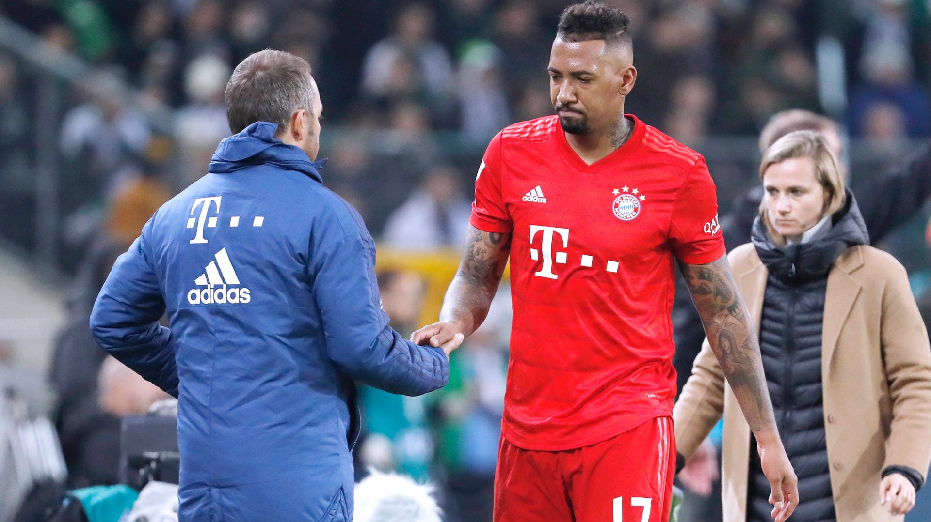 Bayerns Boateng (r.) mit Interimstrainer Flick.