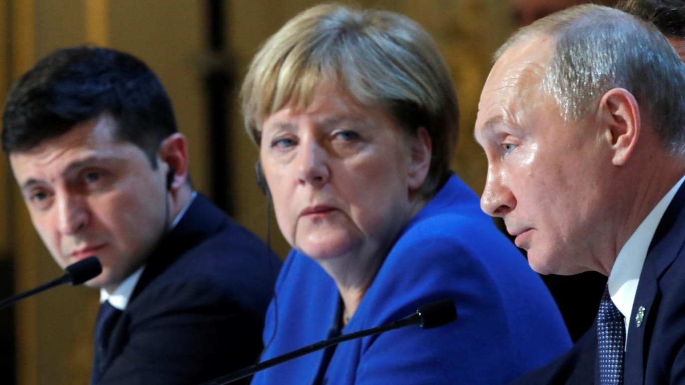 Angela Merkel und Wladimir Putin in Paris: Die Bundesregierung sieht im Fall des Mordes an einem Georgier in Berlin noch nicht alle Fragen beantwortet.
