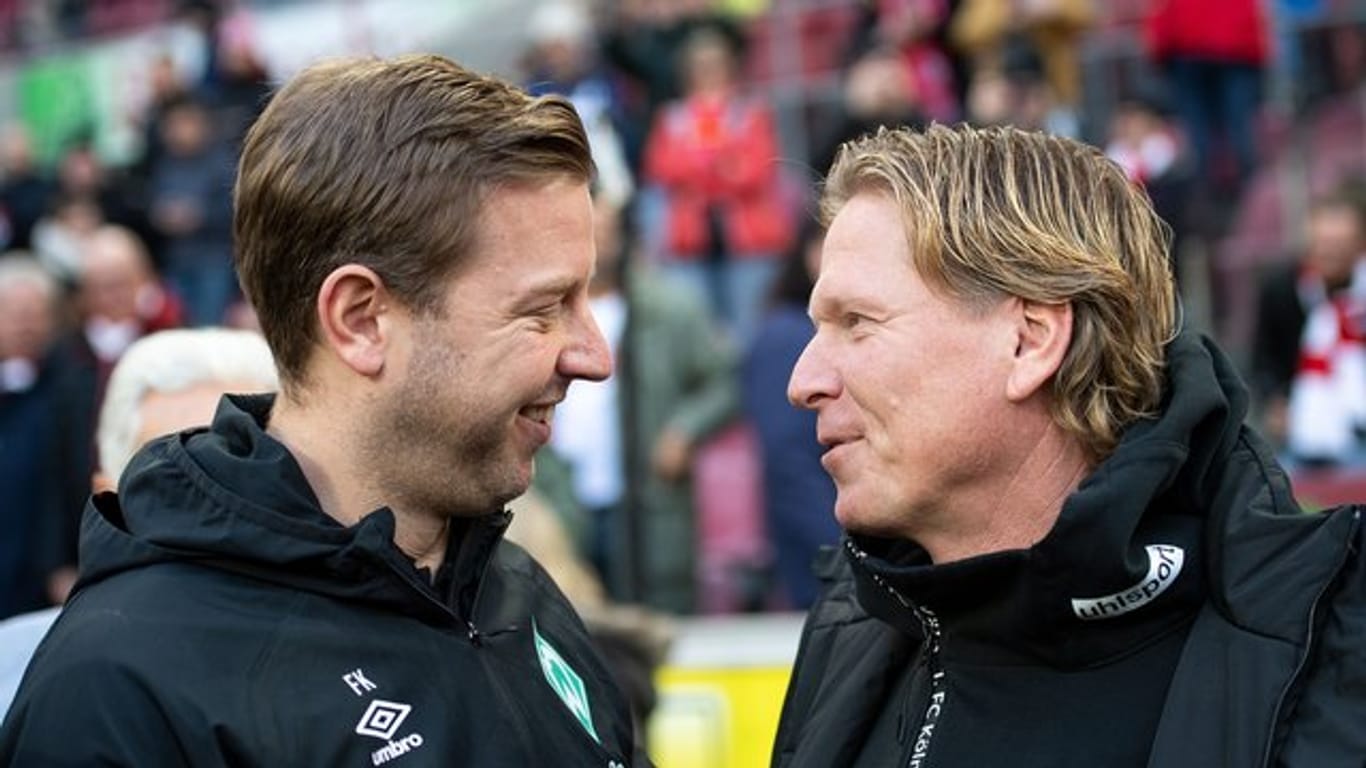 Verstehen sich: Köln-Coach Markus Gisdol (r) und sein Bremer Gegenüber Florian Kohfeldt.