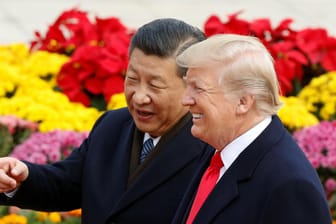 US-Präsident Donald Trump und Chinas Präsident Xi Jinping: Für den Handelsdeal will Trump nach Peking fliegen.