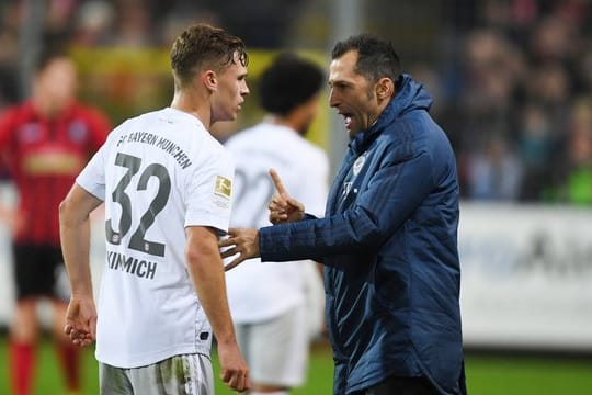 Will beim FC Bayern nicht weiter pendeln: Joshua Kimmich (l).