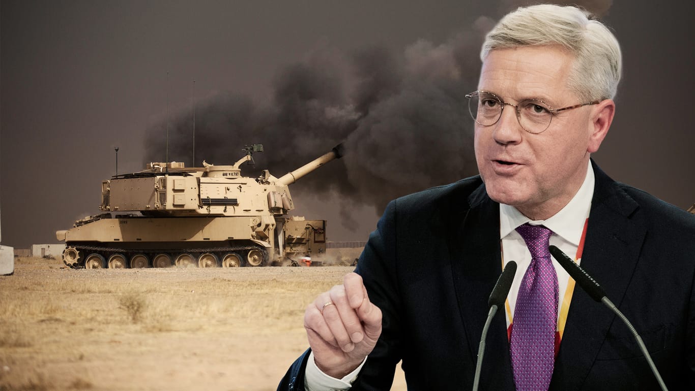 Norbert Röttgen und ein Panzer der US-Armee bei der Bekämpfung des IS (Symbolbild).