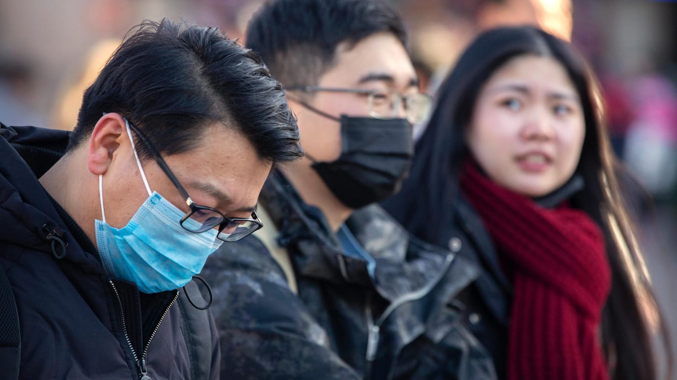 Menschen in Beijing: Ein neuartiges Virus aus China sorgt derzeit für Aufregung.