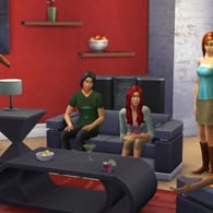Sims sitzen in einem Wohnzimmer: Die Spielereihe "Die Sims" wird 20 Jahre alt.