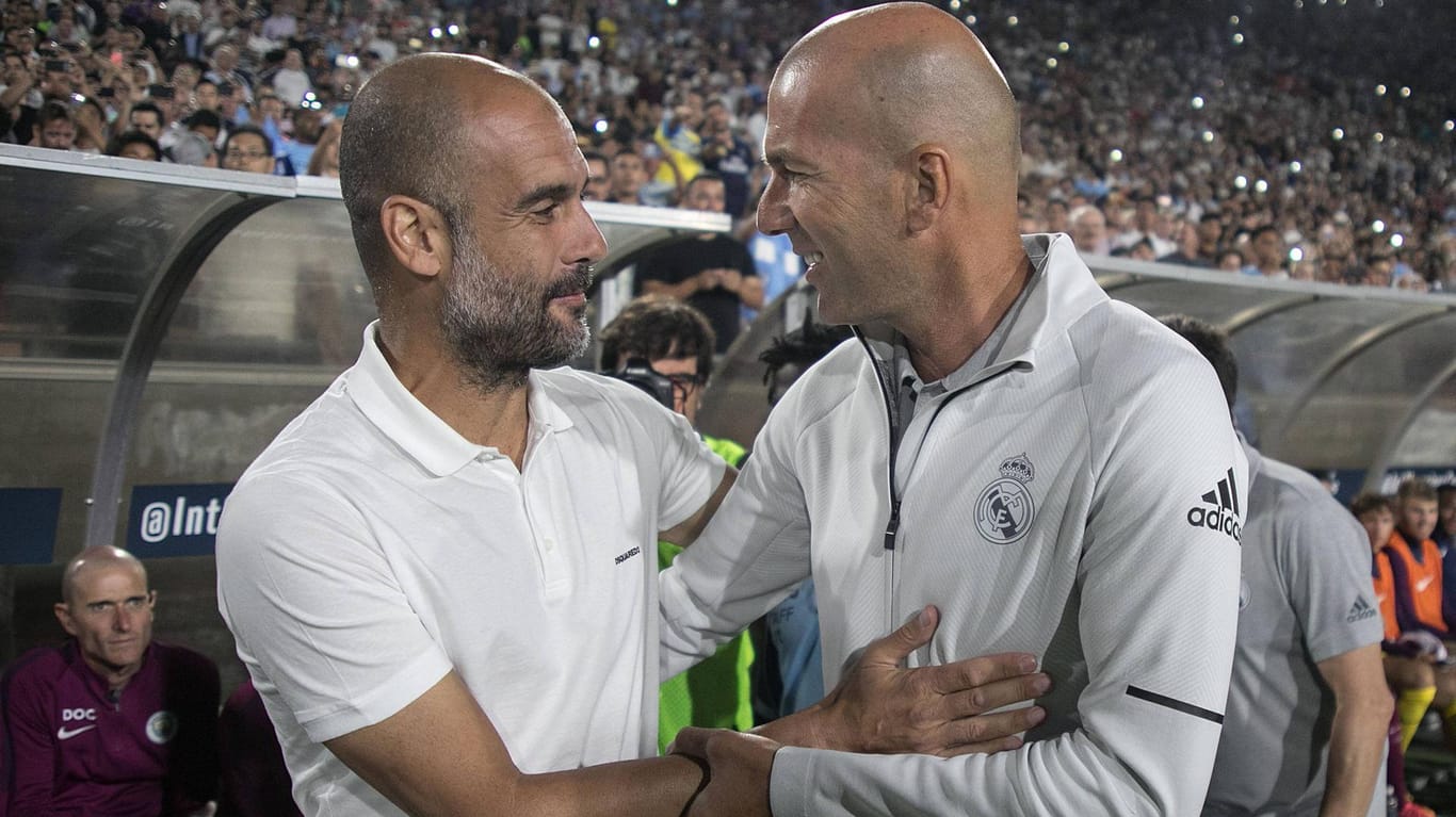 Treffen in der Champions League aufeinander: Pep Guardiola (l.) und Zinedine Zidane.