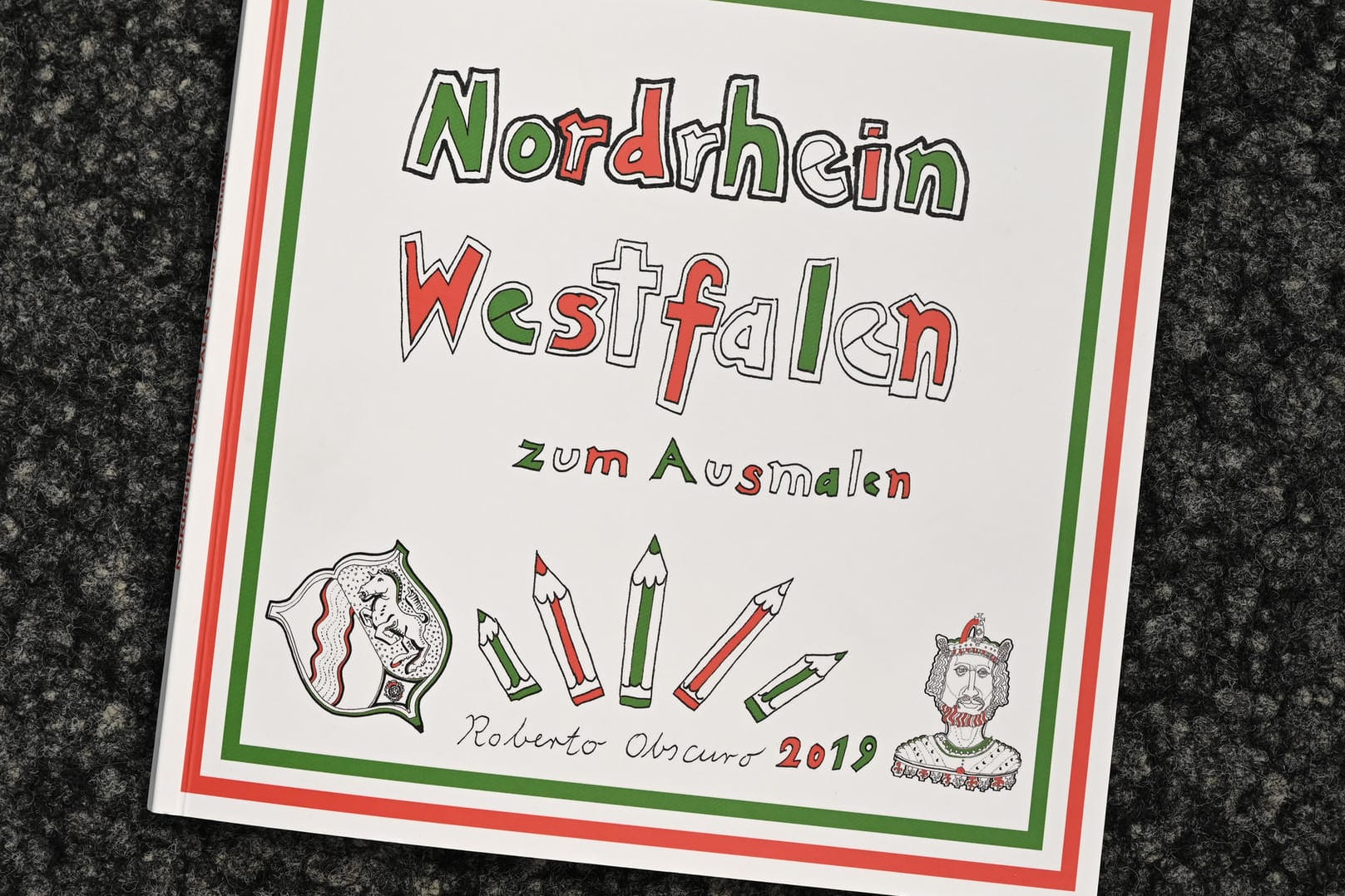 Ein von der AfD verteiltes "Malbuch": Bei einer Veranstaltung der AfD-Landtagsfraktion NRW in Krefeld sollen fremdenfeindliche "Malbücher" verteilt worden sein. Jetzt ermittelt der Staatsschutz.