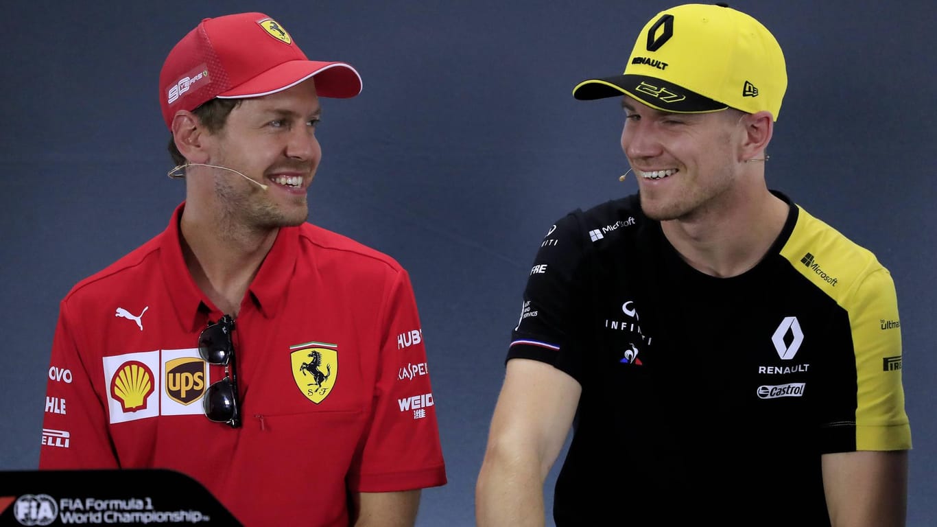 Weggefährten: Sebastian Vettel (li.) und Hülkenberg auf einer Pressekonfrenz in der vergangenen Saison.